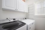 Laundry room with full size washer and dryer just off the kitchen.